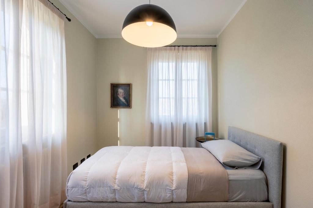 Postel nebo postele na pokoji v ubytování Villa Raggi