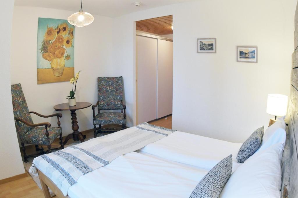 Postel nebo postele na pokoji v ubytování Hôtel Restaurant du Marchairuz