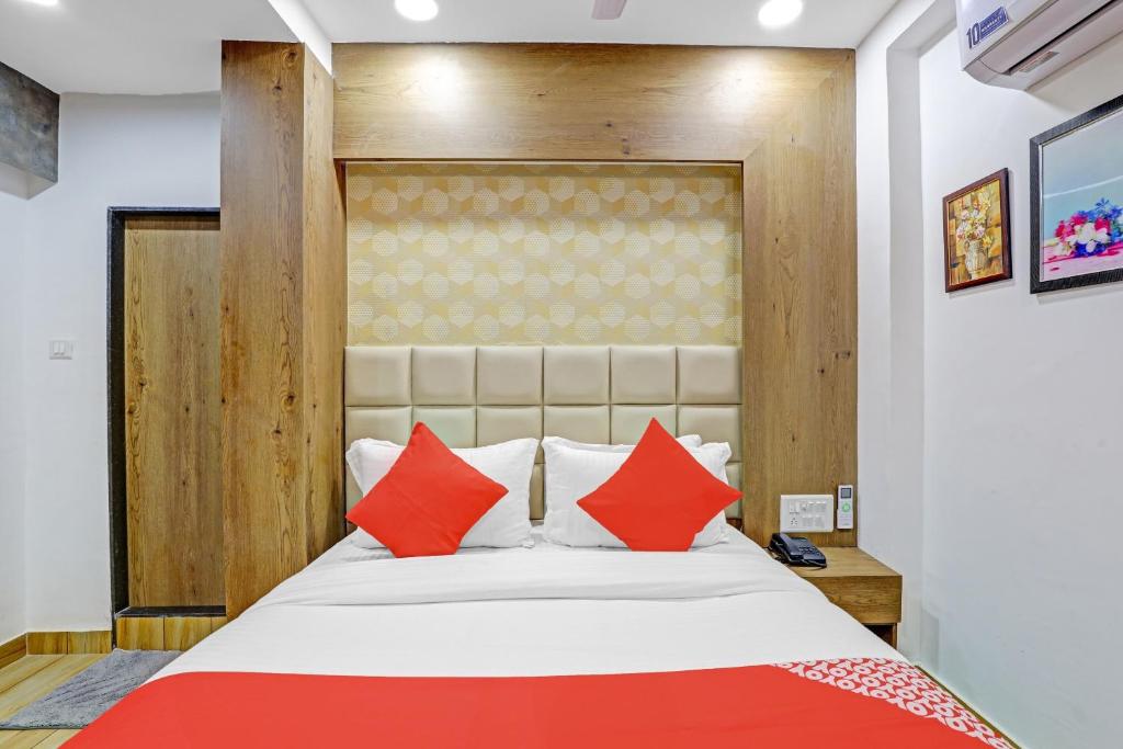 Krevet ili kreveti u jedinici u okviru objekta OYO Hotel R S Palace