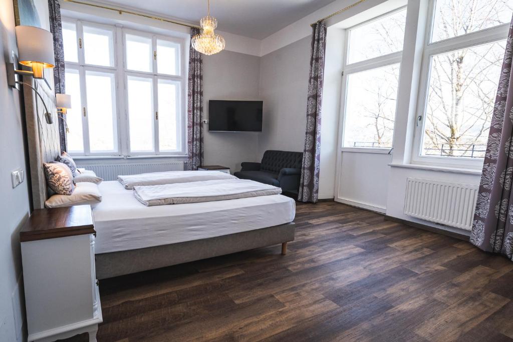 Postel nebo postele na pokoji v ubytování Villa Bergzauber