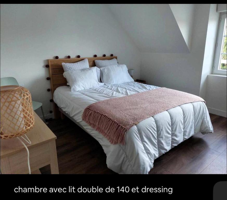 Giường trong phòng chung tại Duplex Cosy 100m2 Terrasse Fouesnant Les Glénan