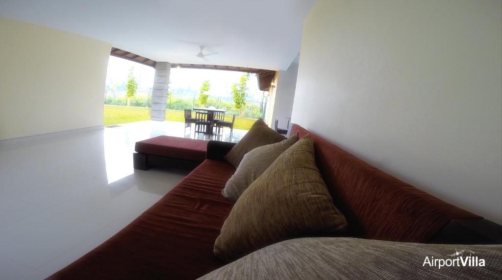 Posezení v ubytování Airport Villa