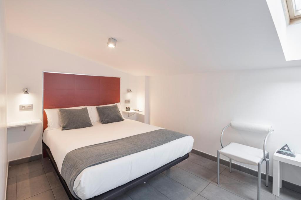 Cama o camas de una habitación en Alda Soria Rooms