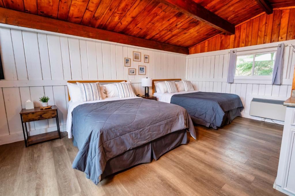 Postel nebo postele na pokoji v ubytování Old Orchard Inn
