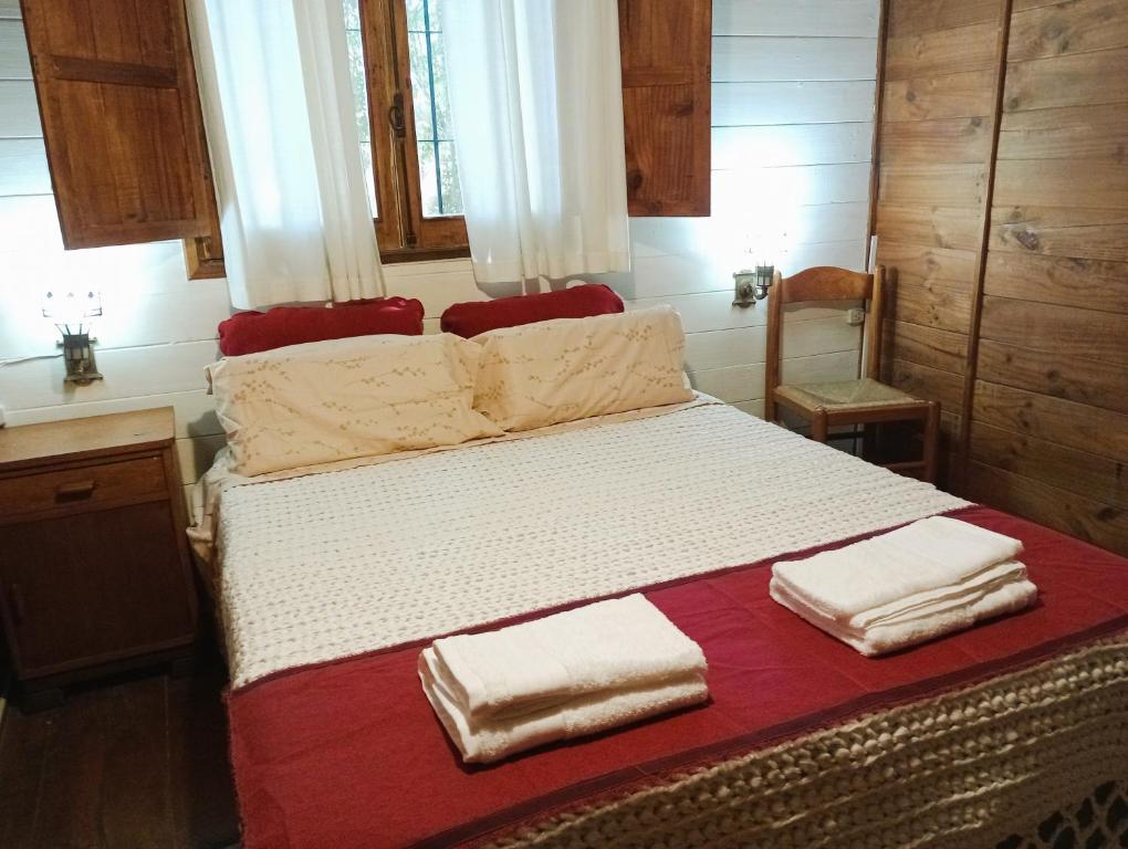 Katil atau katil-katil dalam bilik di Casita del Bosque