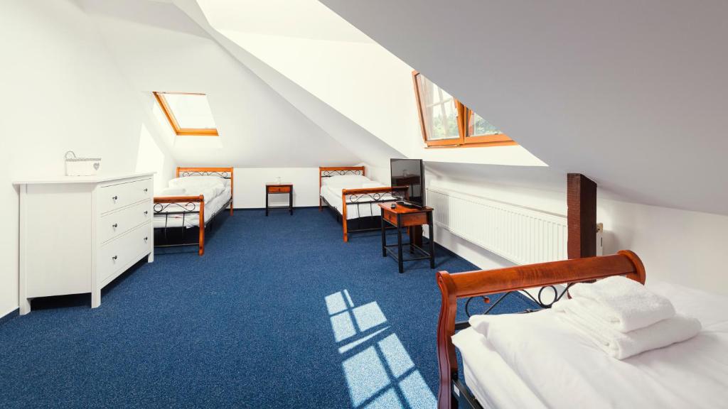 Postel nebo postele na pokoji v ubytování Hotel Ostende