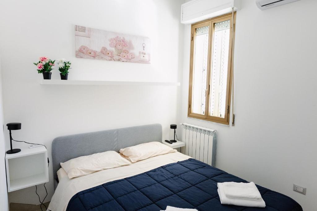 Postel nebo postele na pokoji v ubytování CasaRiso