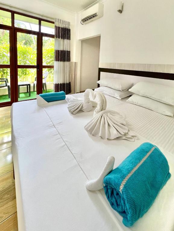 Balma Beach Inn - Drievoudige Kamer Met Balkon