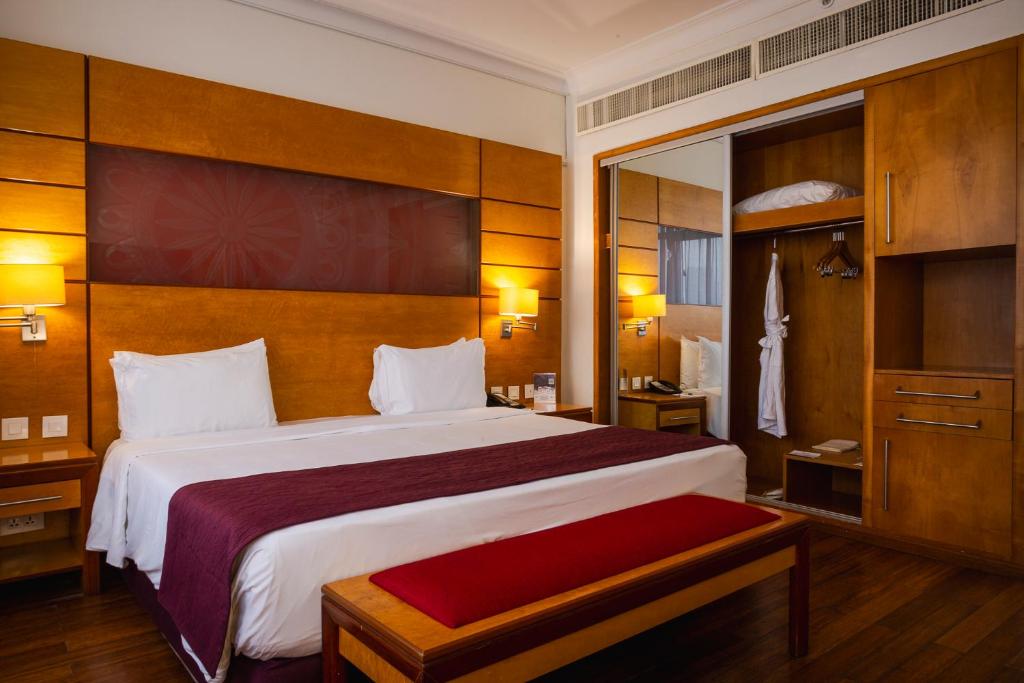 Voodi või voodid majutusasutuse Eko Hotel Suites toas