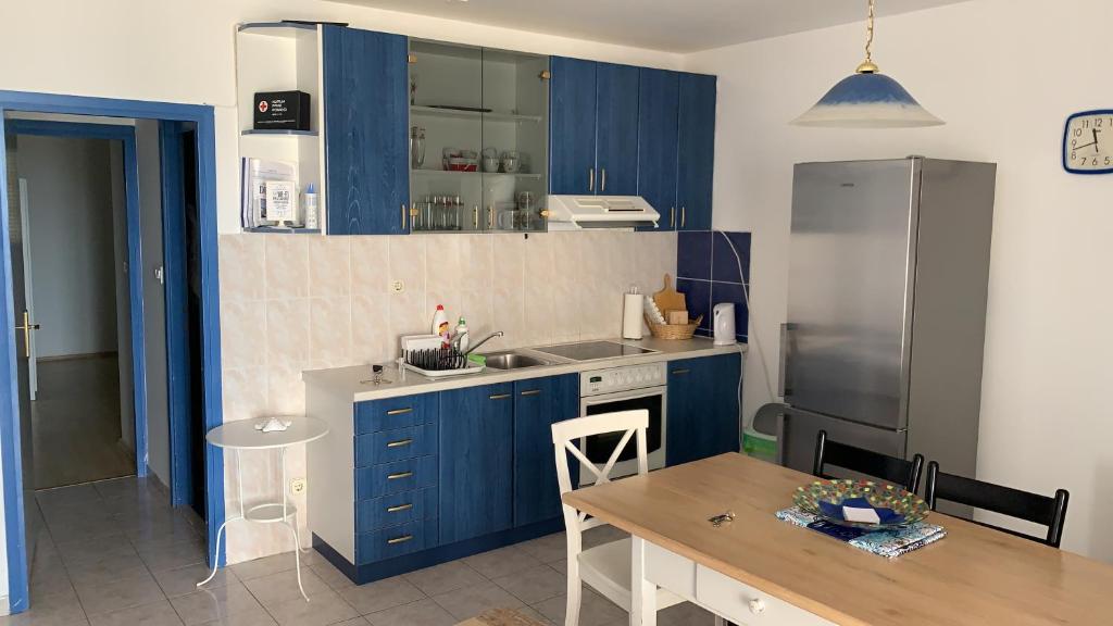 مطبخ أو مطبخ صغير في Apartmani Bosiljevac
