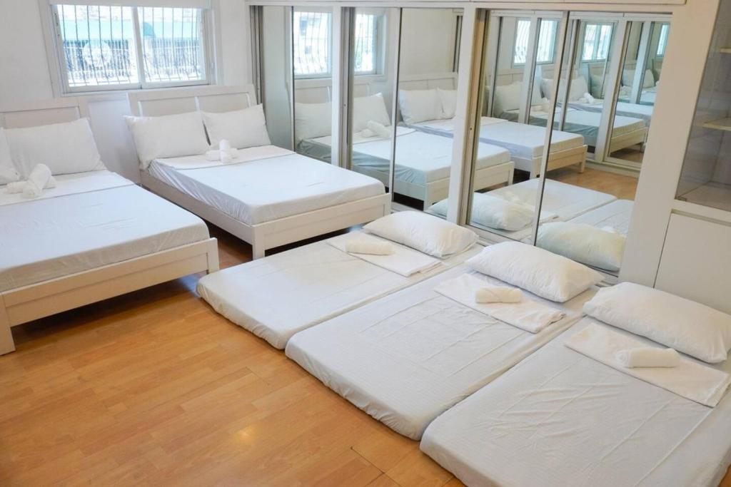 Postelja oz. postelje v sobi nastanitve Makati Altean Apartment (Delfin Room)