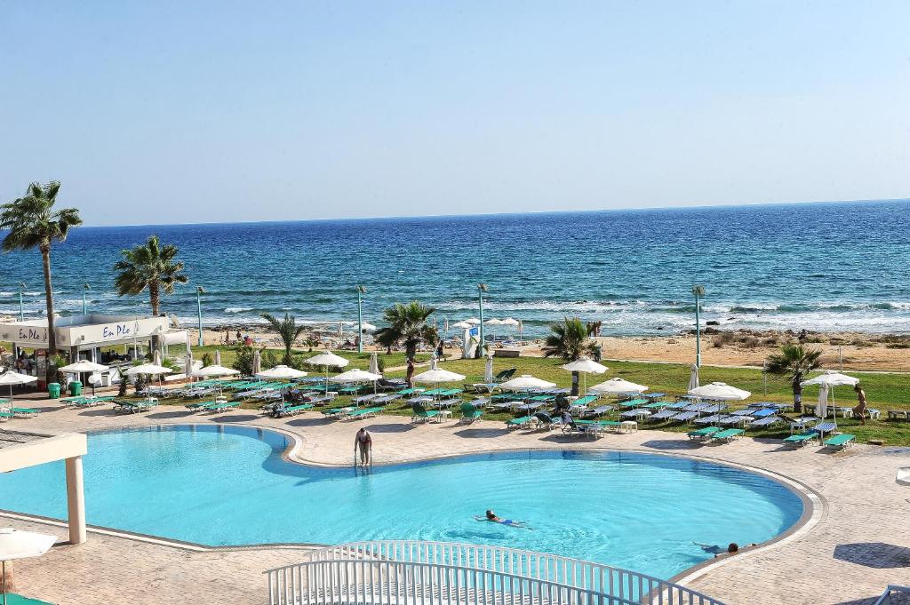 a view of a swimming pool and the beach at Piere - Anne Beach Hotel in Ayia Napa