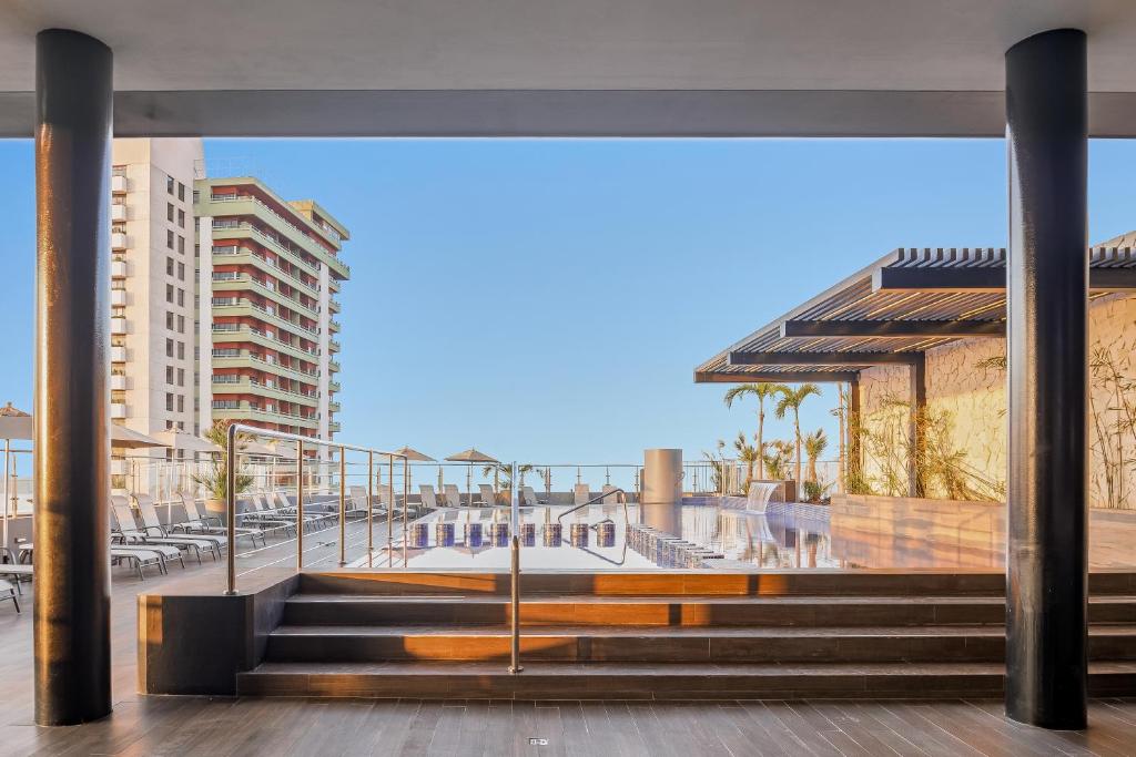 a view of a city with stairs and buildings at Fiesta Inn Mazatlán in Mazatlán