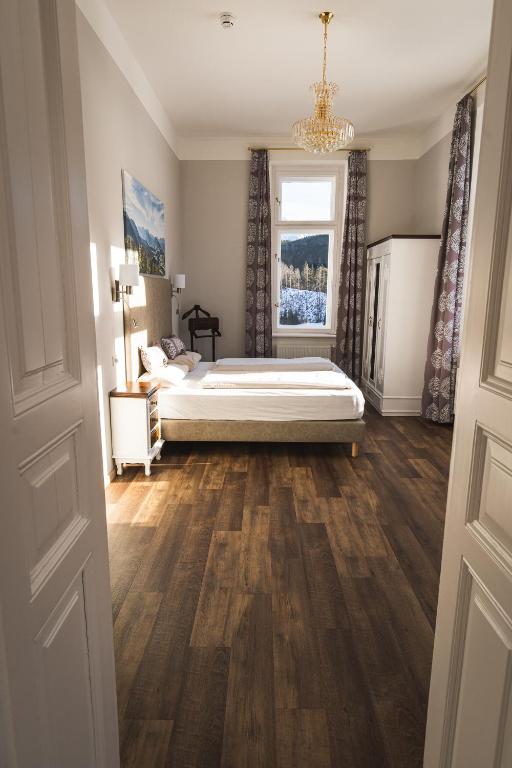 Postel nebo postele na pokoji v ubytování Villa Bergzauber