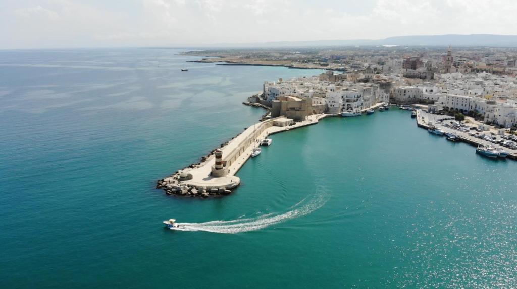 an aerial view of a city in the water at Dimora Palestro by MANZONI COLLECTION in Monopoli