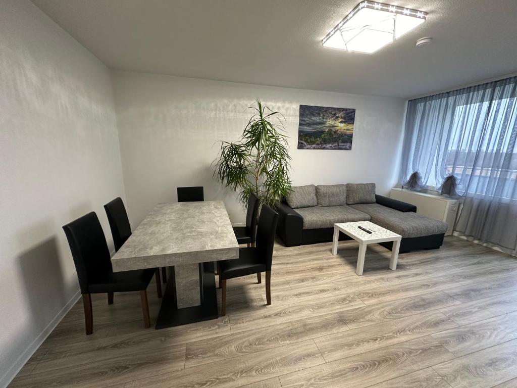 Χώρος καθιστικού στο Olis Appartement in Neuss