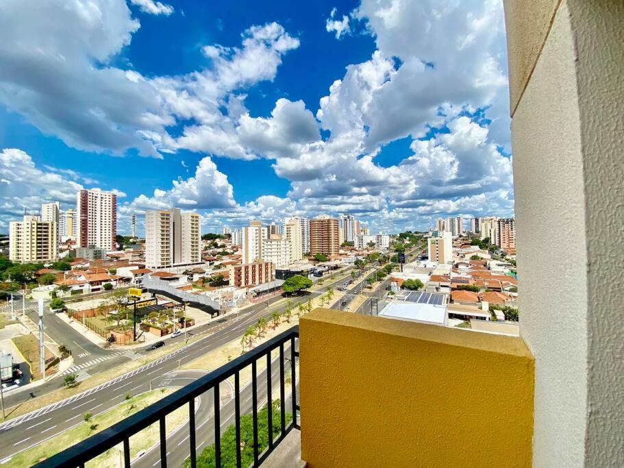 a view of a city from a balcony at Flat Amplo em frente USP/FOB in Bauru