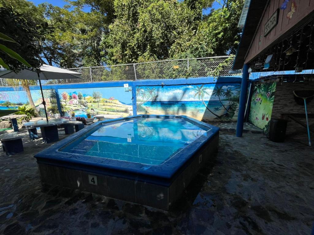 Bazén v ubytování Sana El Jardin Secreto nebo v jeho okolí