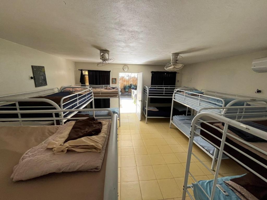 Postel nebo postele na pokoji v ubytování Sana El Jardin Secreto