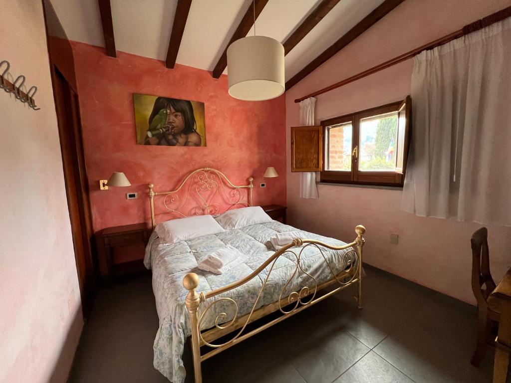 Postel nebo postele na pokoji v ubytování Hotel Villalago trasimeno