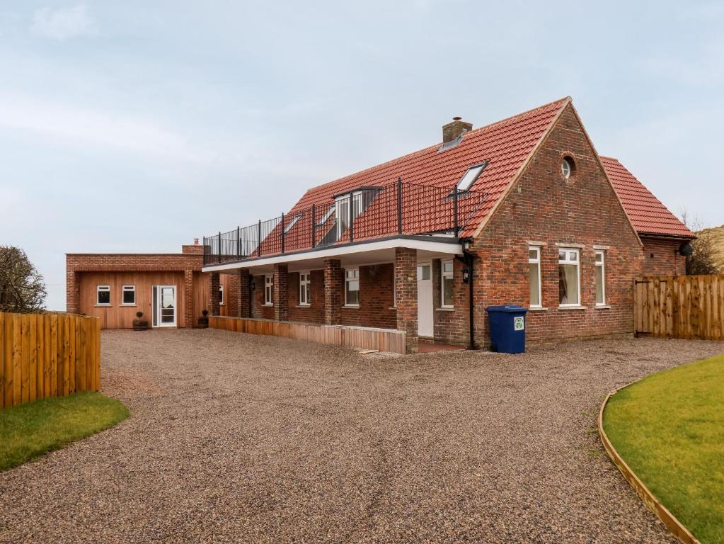 ウィットビーにあるThe Old Guard Houseのレンガ造りの家