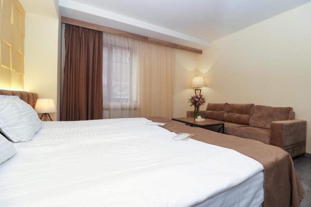 Posezení v ubytování MANDARIN Hotel