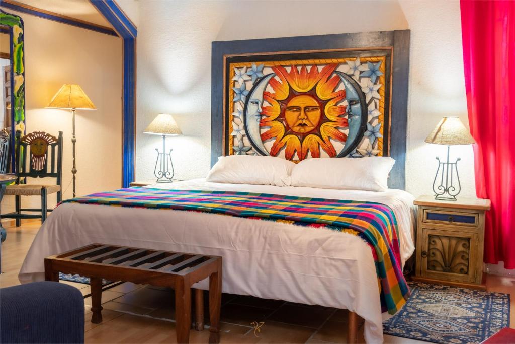 Postel nebo postele na pokoji v ubytování Hotel Rincon de Josefa