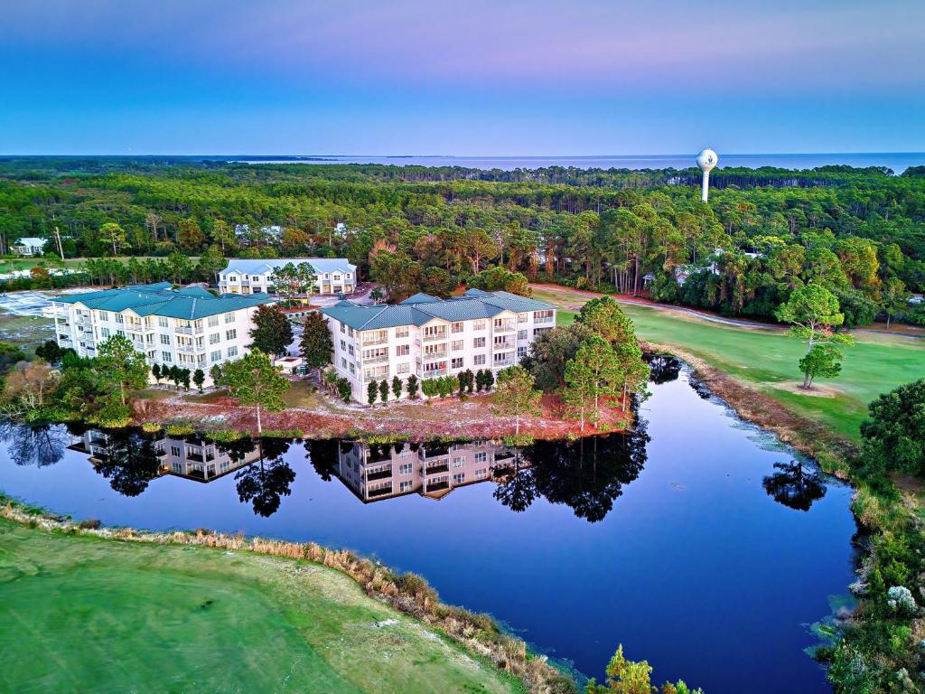 an aerial view of a resort with a lake at St James Bay Golf & Pickleball Resort in Big Blackjack Landing