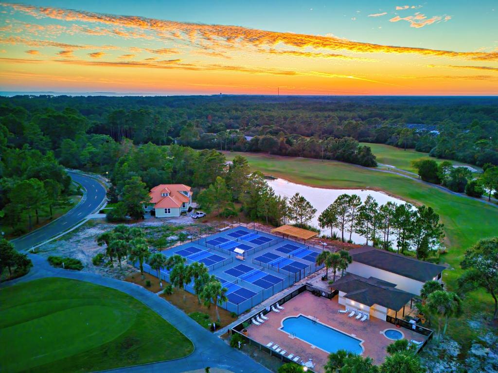 an aerial view of a home with a pool at St James Bay Golf & Pickleball Resort in Big Blackjack Landing