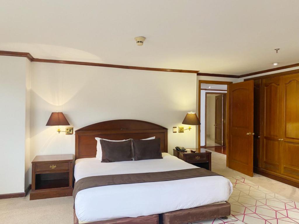 Postel nebo postele na pokoji v ubytování Hotel Bogotá Regency Usaquén