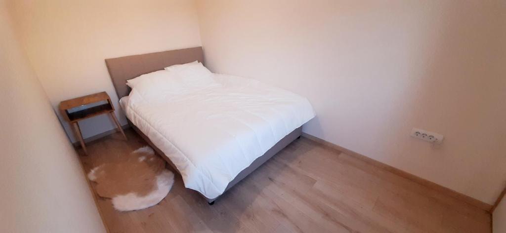 Postel nebo postele na pokoji v ubytování Apartman Studenjak