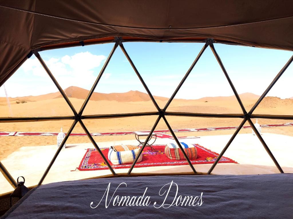 Postel nebo postele na pokoji v ubytování Nomada Domes Camp with Airco