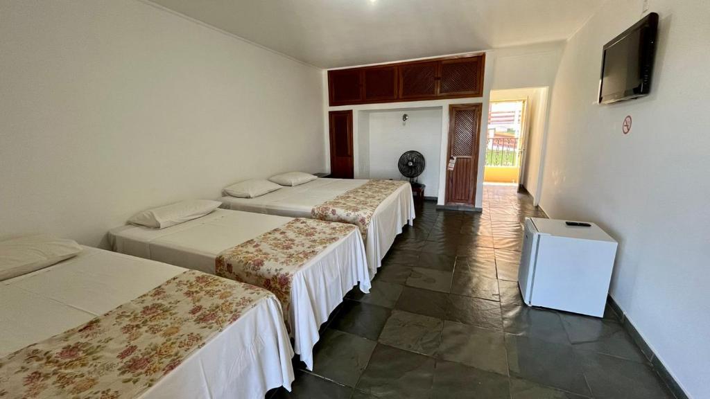 Postel nebo postele na pokoji v ubytování Hotel Varandas do Sol