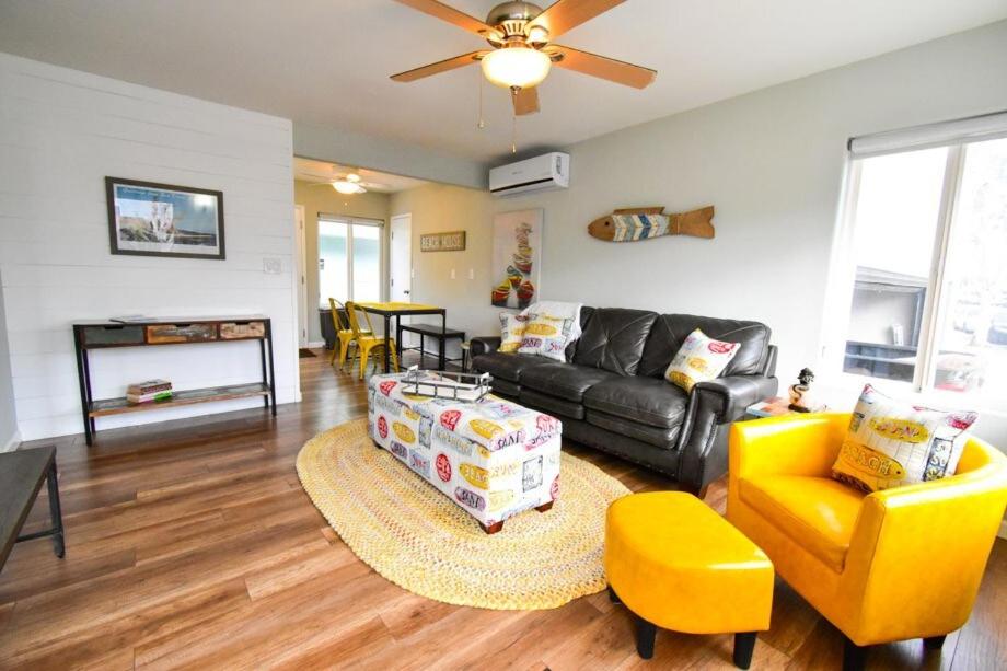a living room with a couch and a chair at Beach-2-Bay 1br - In the Heart of Mission Beach in San Diego