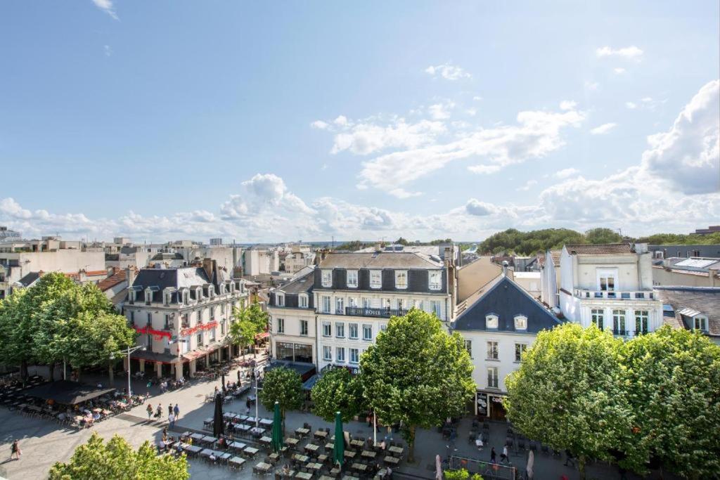 an aerial view of a city with buildings at maison pas loin centre-ville in Reims