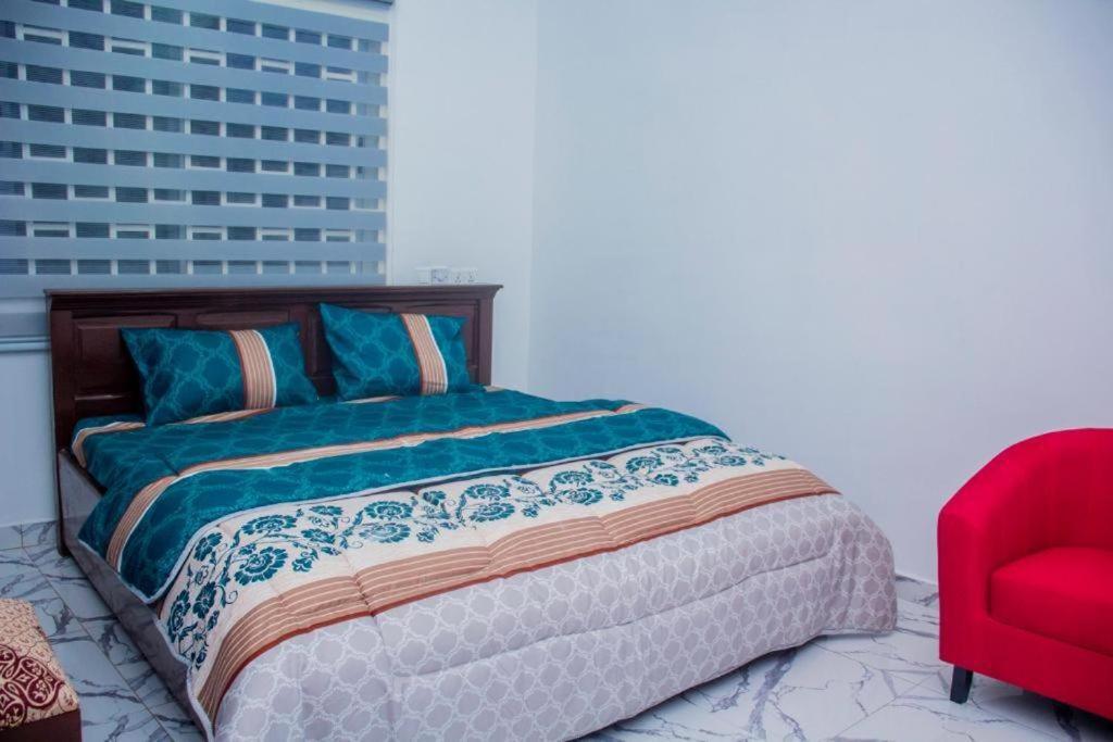Cama ou camas em um quarto em Satellite City Lodge