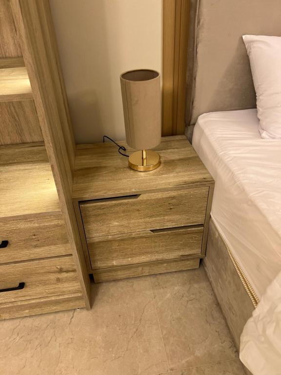 Postel nebo postele na pokoji v ubytování Cozy Royal Rooms in new cairo