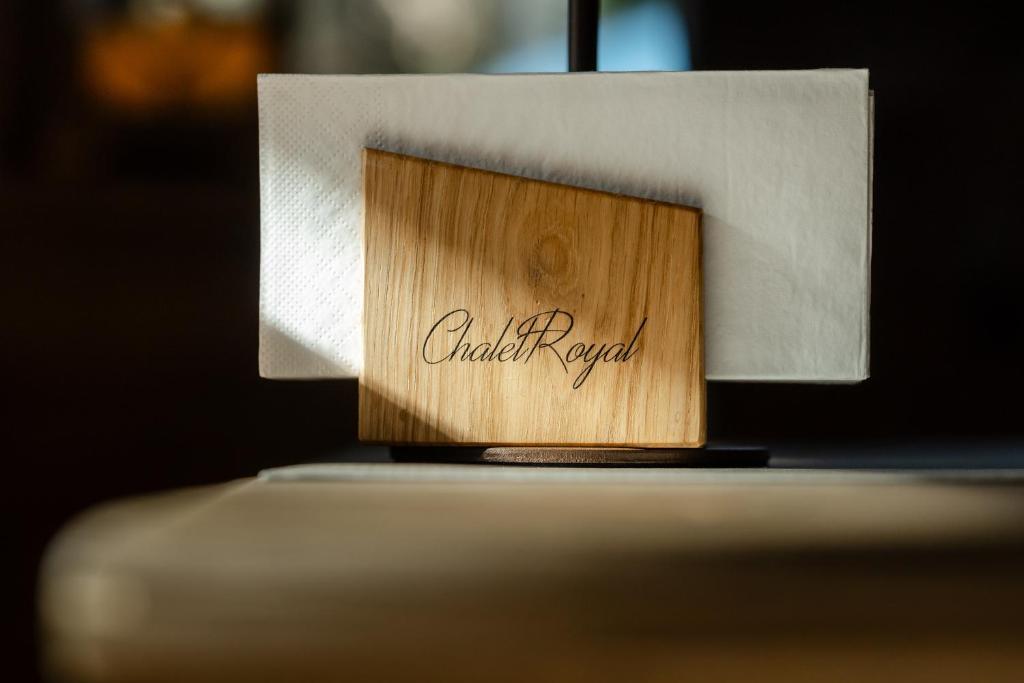 Certifikát, hodnocení, plakát nebo jiný dokument vystavený v ubytování Chalet Royal