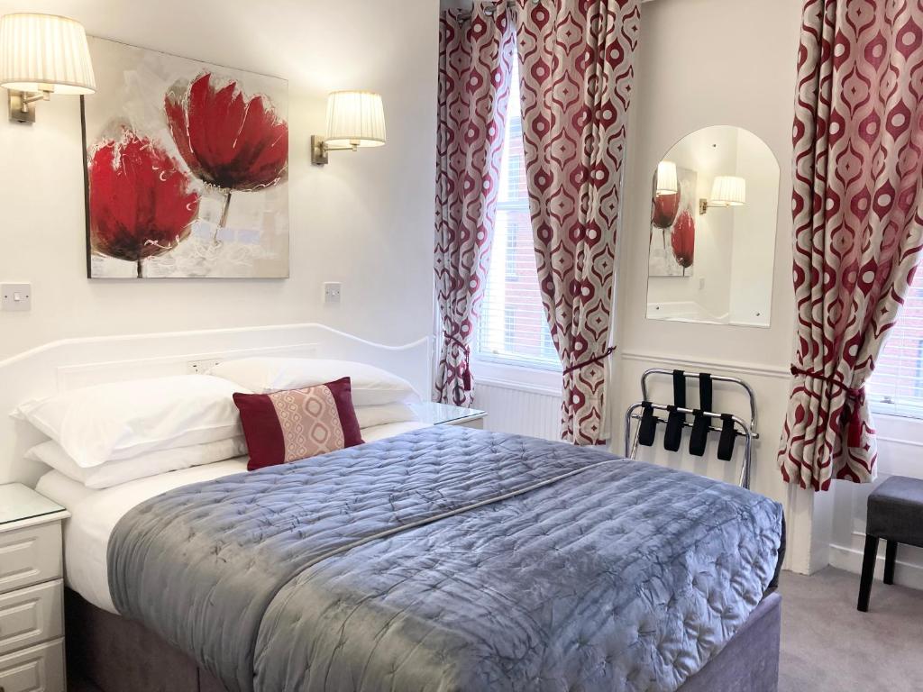 Krevet ili kreveti u jedinici u okviru objekta Dergvale Hotel