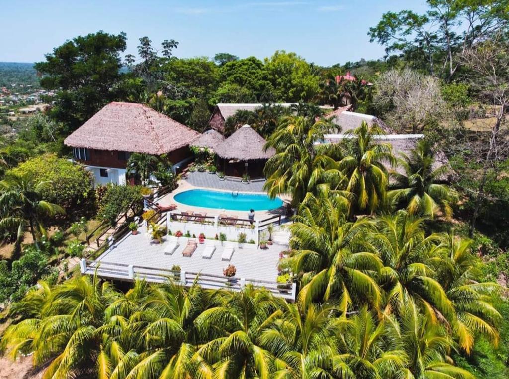 an aerial view of a resort with a swimming pool at Carlo's swimming pool in Rurrenabaque