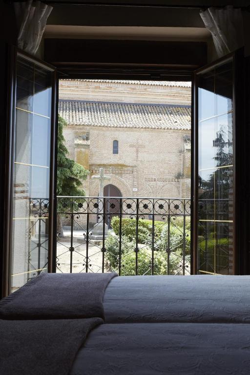 Postel nebo postele na pokoji v ubytování Casa Rural La Casa de Las Manuelas
