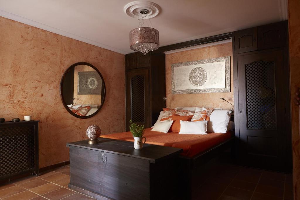 Postel nebo postele na pokoji v ubytování Casa Rural La Casa de Las Manuelas