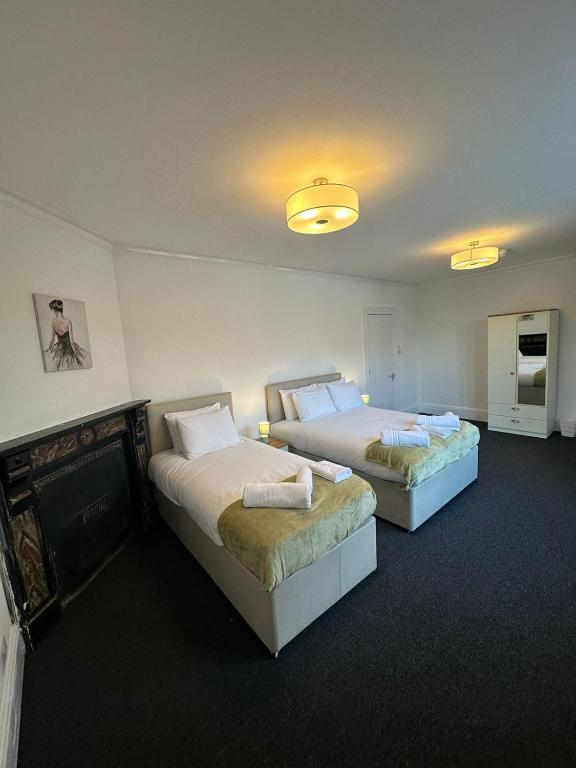 Cambridge Central Rooms - Tas Accommodations - Habitación Familiar Con Baño Compartido
