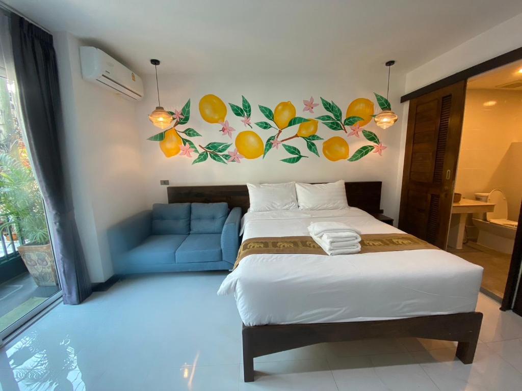 Postel nebo postele na pokoji v ubytování Lemon Guesthouse