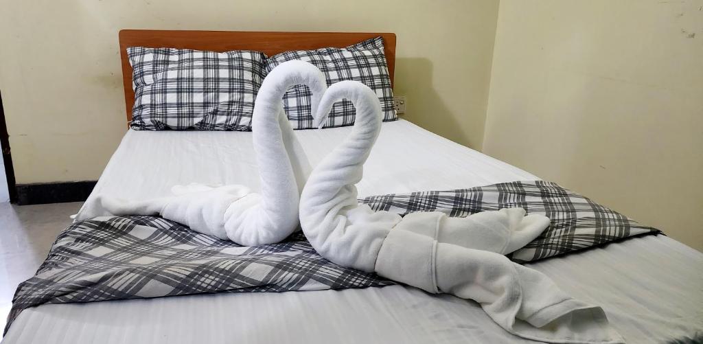 Postel nebo postele na pokoji v ubytování Rasi Mount Rest