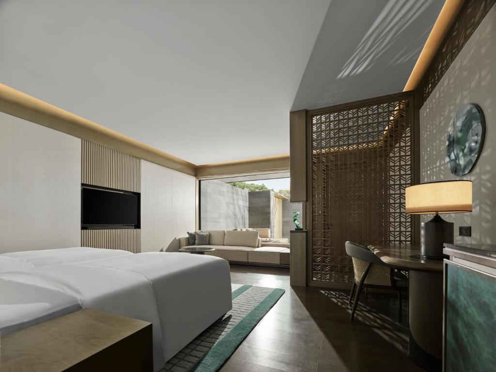 TV a/nebo společenská místnost v ubytování Banyan Tree Suzhou Shishan