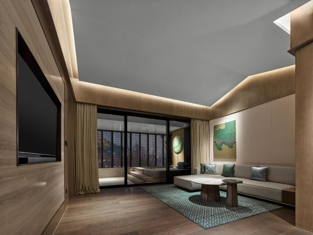 Posezení v ubytování Banyan Tree Suzhou Shishan