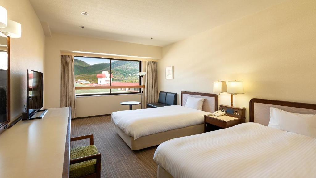 EN RESORT Re'Cove Hakoneにあるベッド