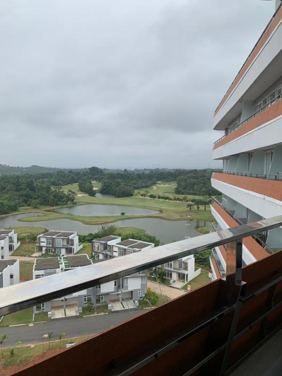 a view of a river from the balcony of a building at Golf Resort View at Kaina Tower Nuvasa Bay 9B22 in Nongsa