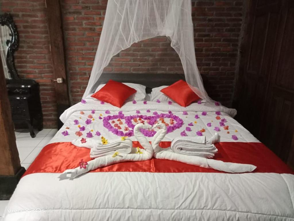 Una cama o camas en una habitación de Villa Mak Cik